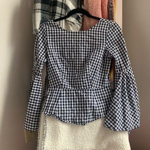 Black and white checkered blouse